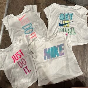 Baby girl 12 month Nike shirts. Never worn